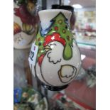 A Moorcroft Pottery Vase, painted in the 'Three French Hens' pattern from The Twelve Days of