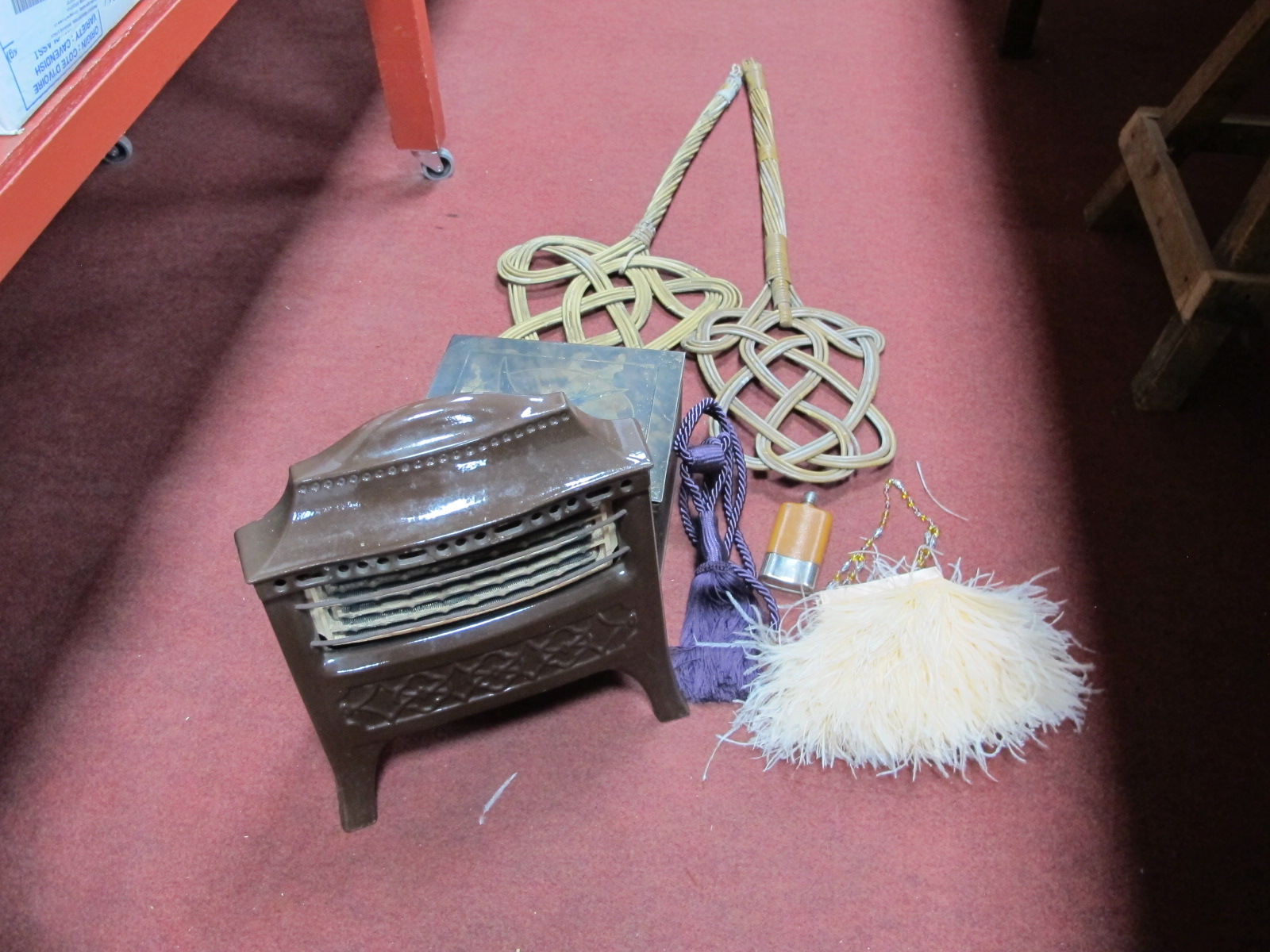 A Mid XX Century Enamel Electric Fire, two Victorian carpet beaters etc:- One Box