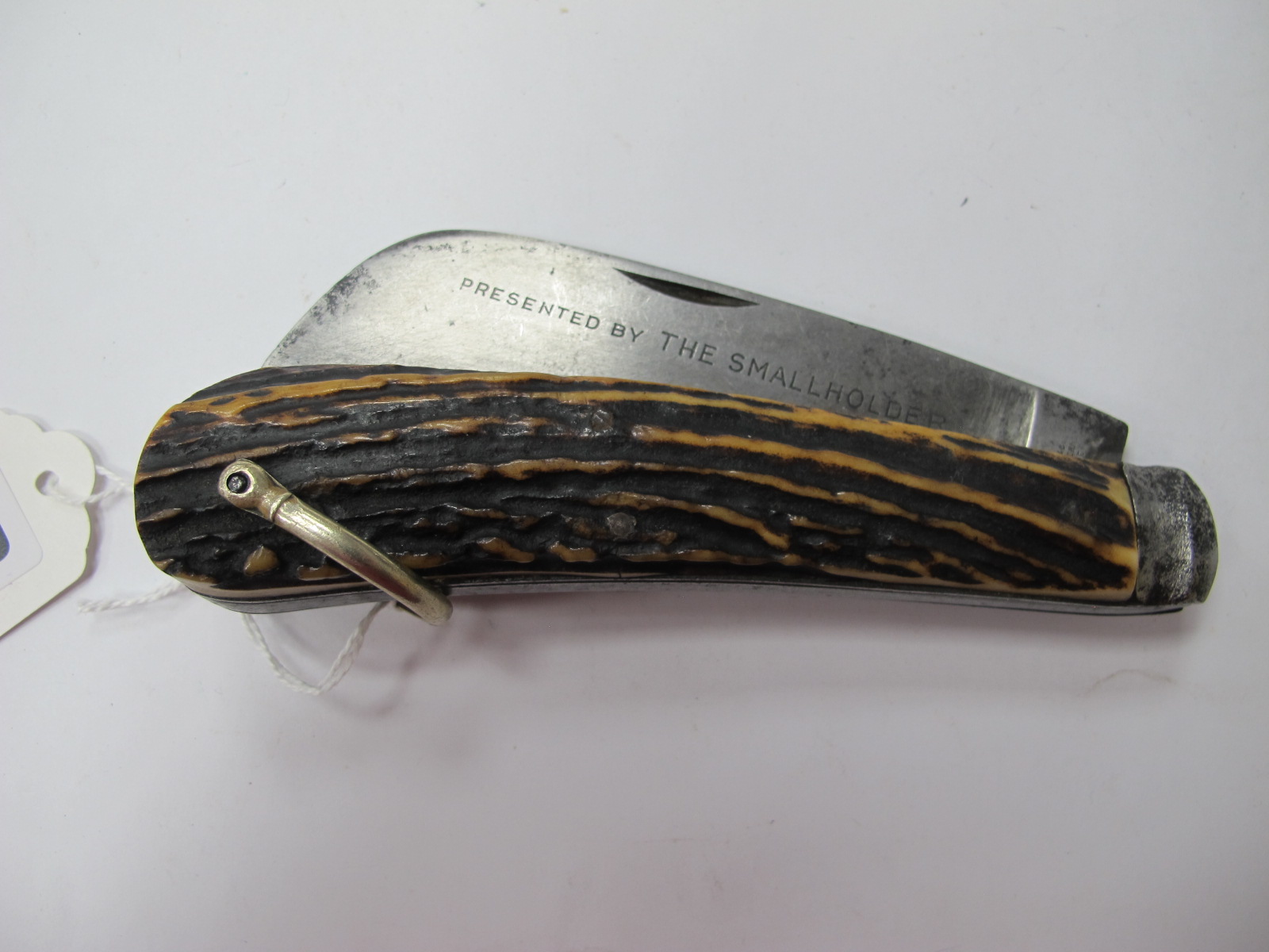 A Pocket Knife/Large Pruner, presented to 'The Small Holder' embossed on blade, by Wylie and Co,