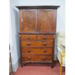 A XIX Century Mahogany Linen Press, the top with twin panelled doors, two internal shelves, base