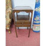 An Early XIX Century Mahogany Washstand, apron with a brushing slide, with two small drawers, on