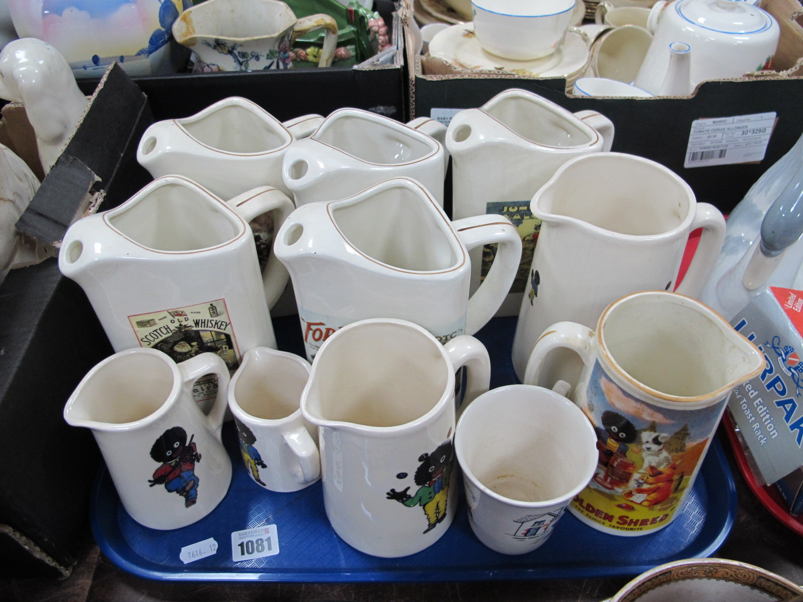 Five 'Trent' Whisky Water Jugs, Golden Shred Jugs, and chipped Robertson's mug:- One Tray