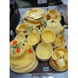 R. Venton and Other Breakfast Ware, approximately forty seven pieces, featuring fruit on yellow