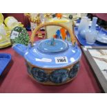 A Troika Blue Painted Glazed Teapot, featuring blue circles to matt body, cane loop handle, marked