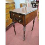 A XIX Century Mahogany Pembroke Table, with drop leaves, two small drawers, two dummy drawers to