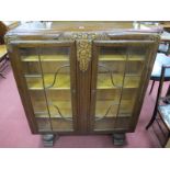 1920's Oak Display Cabinet, with glazed doors, on cup cover supports, 105cm wide.