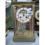 Am Early XX Century Mantel Clock, with an enamel dial, (D), Mercury pendulum, stamped on back plate,