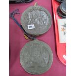 A Pair of Victorian Wax Circular Hanging Plaques, moulded with Queen Victoria on horseback, the