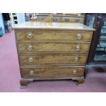 A XIX Century Mahogany Chest of Drawers, with cross banded top, four long drawers, with boxwood