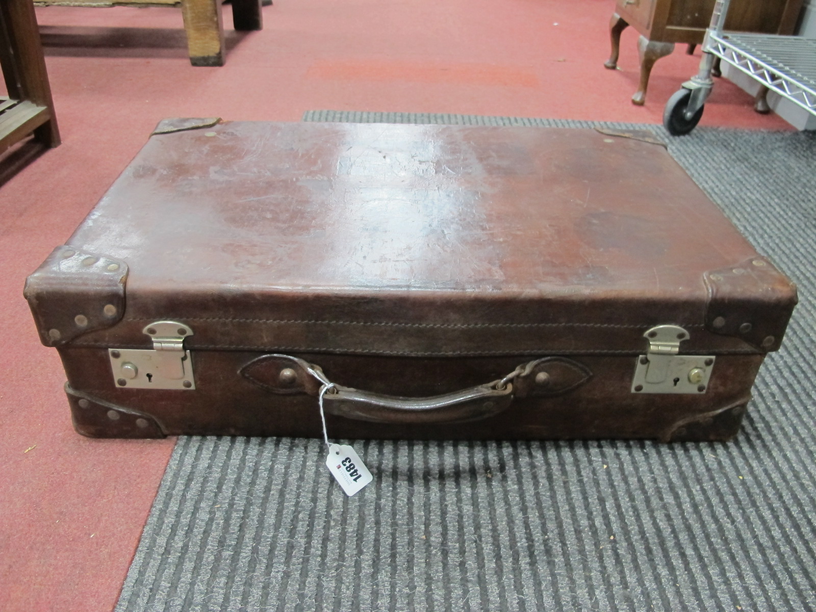 An Early XX Century Heavy Quality Leather Suitcase, with interior label for 'J. Bennet of