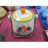 A Clarice Cliff Lotus Pattern Biscuit Barrel, (chips to lid) 16cm high.