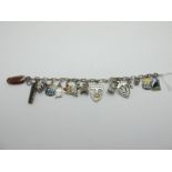 A Vintage Charm Bracelet, suspending assorted novelty charm pendants, including a miniature two