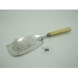 A Georgian Hallmarked Silver Fish Slice, J.H., London 1823, with decorative stylised scroll fish