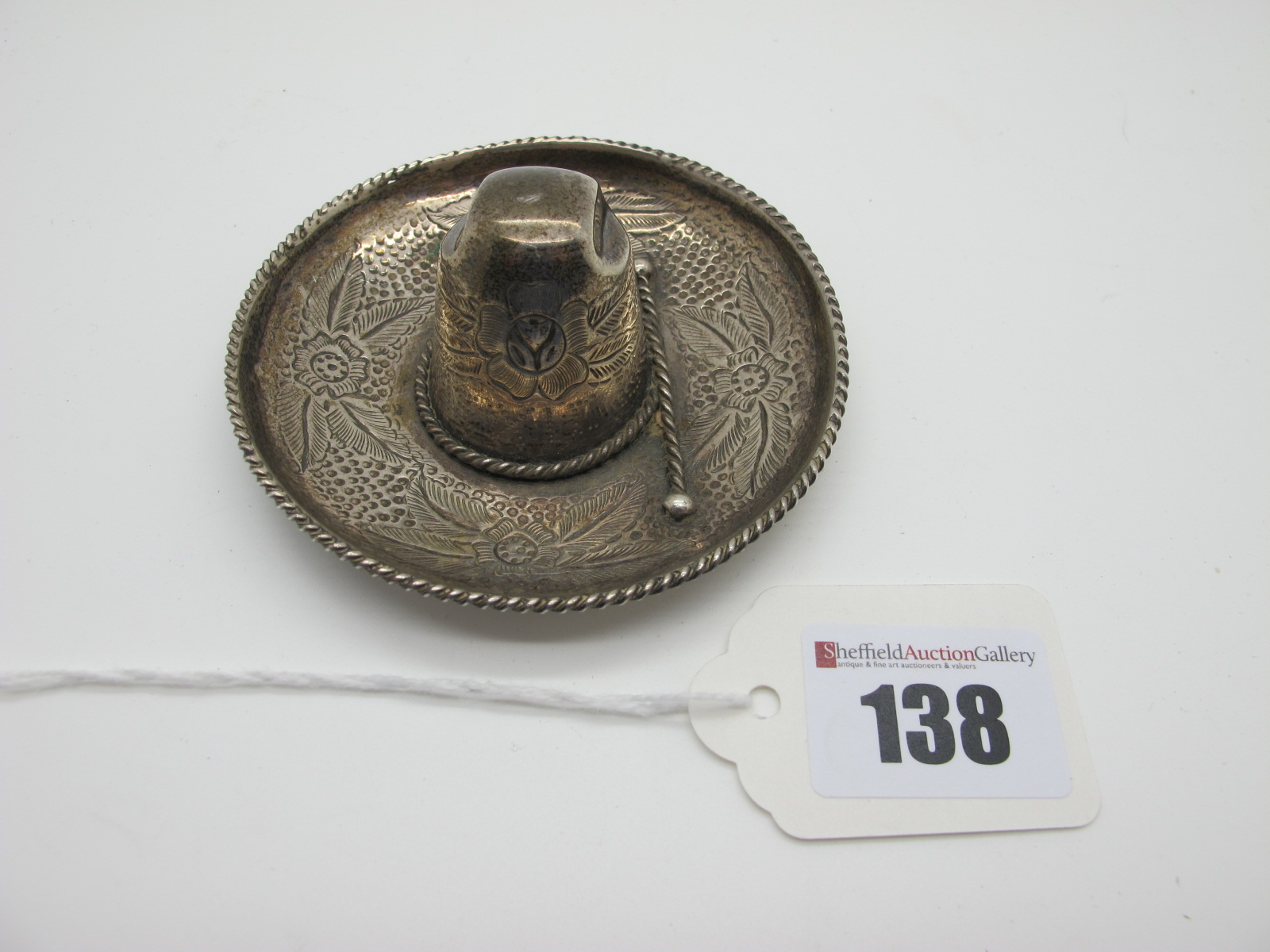 A Novelty Mexican Sombrero Hat, stamped "Sterling Mexico", 8.5cm diameter.