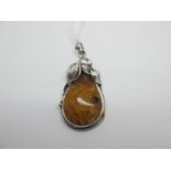 A Modern Amber Pendant, of stylised design with leafy surmount, stamped "925".