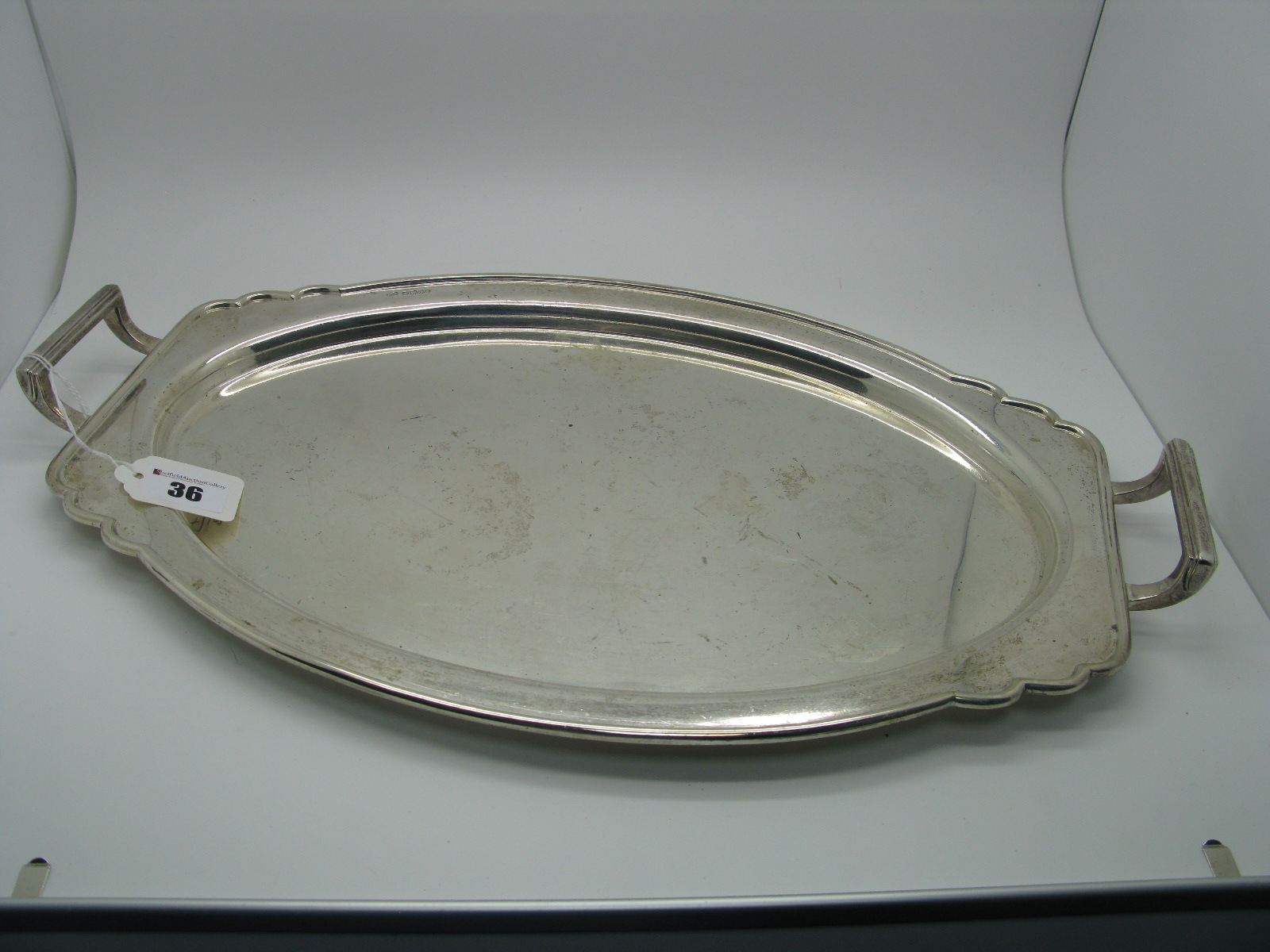 A Hallmarked Silver Tray, Frank Cobb & Co., Sheffield 1934 (Silver Jubilee mark) of plain shaped