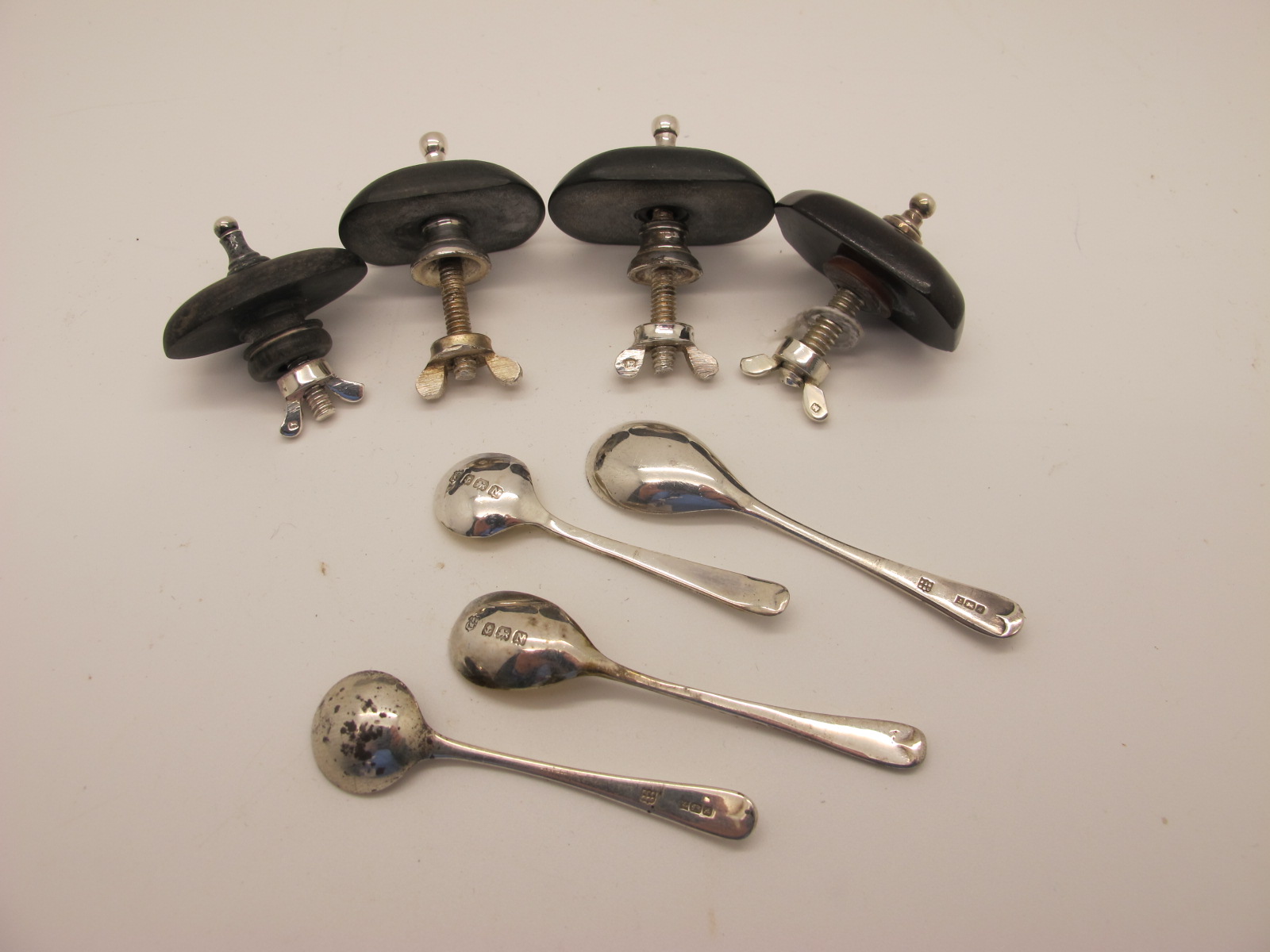 Four Hallmarked Silver Salt/Mustard Spoons, together with four vintage teapot finials.