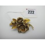 A Vintage 18ct Gold Floral Spray Brooch, with claw set highlights, (Birmingham 1973) (21.5grams).