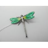 A Large Green and Yellow Enamel Dragonfly Brooch, with articulated wings, stamped "Silver", 7cm