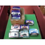 Fourteen Corgi Diecast Model Vehicles, Cadbury and Motoring Memories Editions noted, boxed.