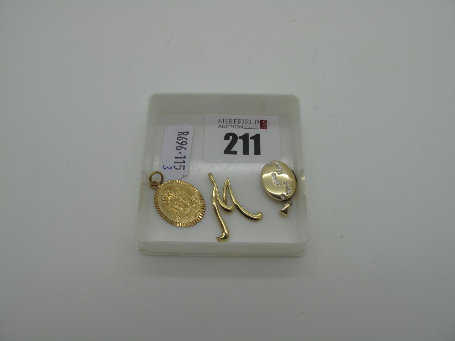 A 9ct Gold St Christopher Pendant, a modern 9ct gold oval locket (total weight 2.5grams), and an