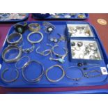 Assorted Modern Dress Rings, bangles (stones missing), hinged bangle stamped "925", etc:- One Tray