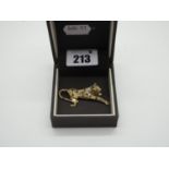 A Modern 9ct Gold Leopard Brooch, of textured design with inset highlights (7grams).