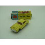 Corgi Toys No 218 Aston Martin DB4, in yellow, overall very good, would benefit from a clean,