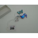 Swarovski; A Modern Seahorse Brooch, 7.5cm long; together with a Swarovski butterfly brooch, 3.5cm