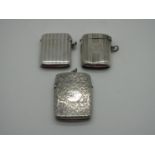 A Hallmarked Silver Vesta Case, allover leaf scroll engraved (split/hinge loose); together with