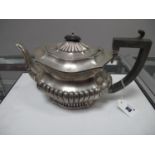 A Hallmarked Silver Tea Pot, JG Ltd, Birmingham 1914, of shaped design, 560grams.