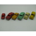 Six 1950's Dinky Cars, including No 157 Jaguar, all playworn, fair.