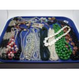 Assorted Vintage and Later Costume Bead Necklaces, shell flowerhead necklace, odd earrings etc:- One