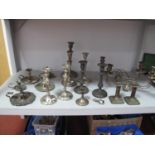 A Collection of Assorted Plated Candlesticks, including two pairs and a pair of twin branches (no