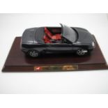 A Corgi 1:18th Scale Diecast Model #95105 MG MGF, boxed, complete with wooden display plinth.