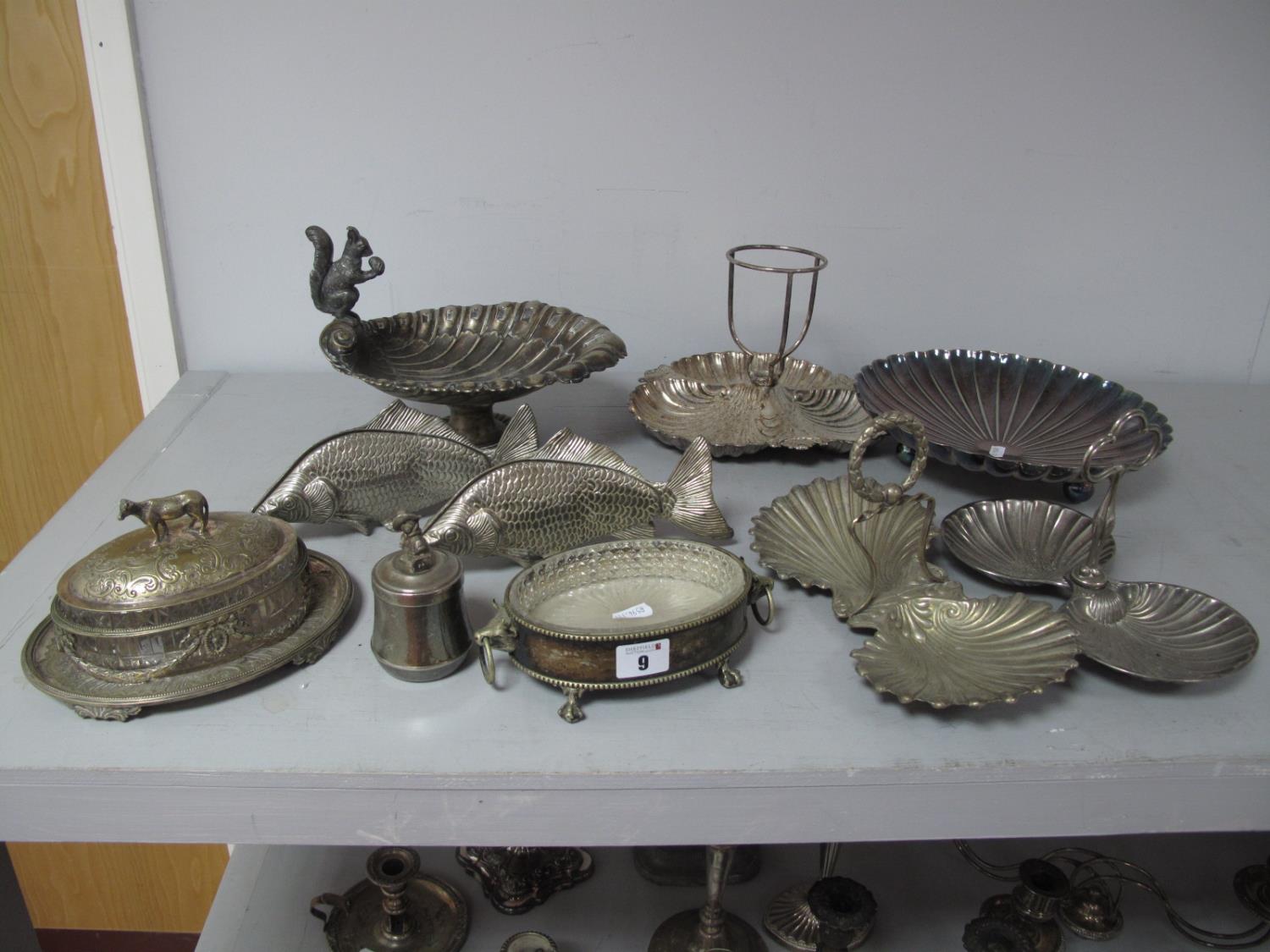 A Plated Pedestal Nut Dish, with seated squirrel, novelty fish, plated mounted glass butter dish