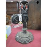 Iron Stand Circa 1900 as a Female, her arms aloft, on aesthetic base, 28cm high.