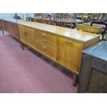 A G Plan Sierra Teak Sideboard, with curved protruding handles to cupboard doors, three drawers