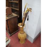 Antler Handled Walking Cane; four with horn handles and basket holder.