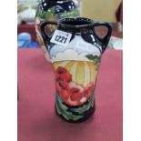 A Moorcroft Pottery Twin Handled Vase, painted in the 'Forever England' design by Vicky Lovatt,