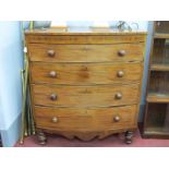 XIX Century Mahogany Bow Front Chest of Three Graduated Drawers, having turned handles, shaped apron