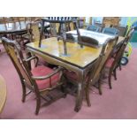 A Set of Eight (six single and two carver) Hardwood Dining Chairs, in the Chinese manner, each