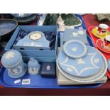 Wedgwood Powder Blue Jasper Ware Clock, (boxed), lidded jar, bell, white 1978 plate, etc:- One Tray