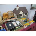 A Wooden Construction Dolls House, in the style of mock Tudor mansion, front and rear opening, eight