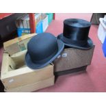 Austin Reed Black Top Hat, 15.5cm wide, in case; Dunn & Co black bowler hat, 15.5cm wide, in case.
