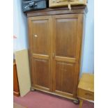 Early XX Century Oak Cupboard, with stepped cornice, panelled doors, bun feet, later inner