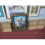 An Ornate Plaster (damaged) Frame, with convex glass to image of Christ with a Child and a White