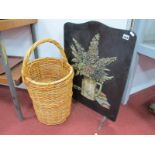 A Vintage Black Painted Wooden Fire Screen, detailed in relief with still life flowers in a jug,