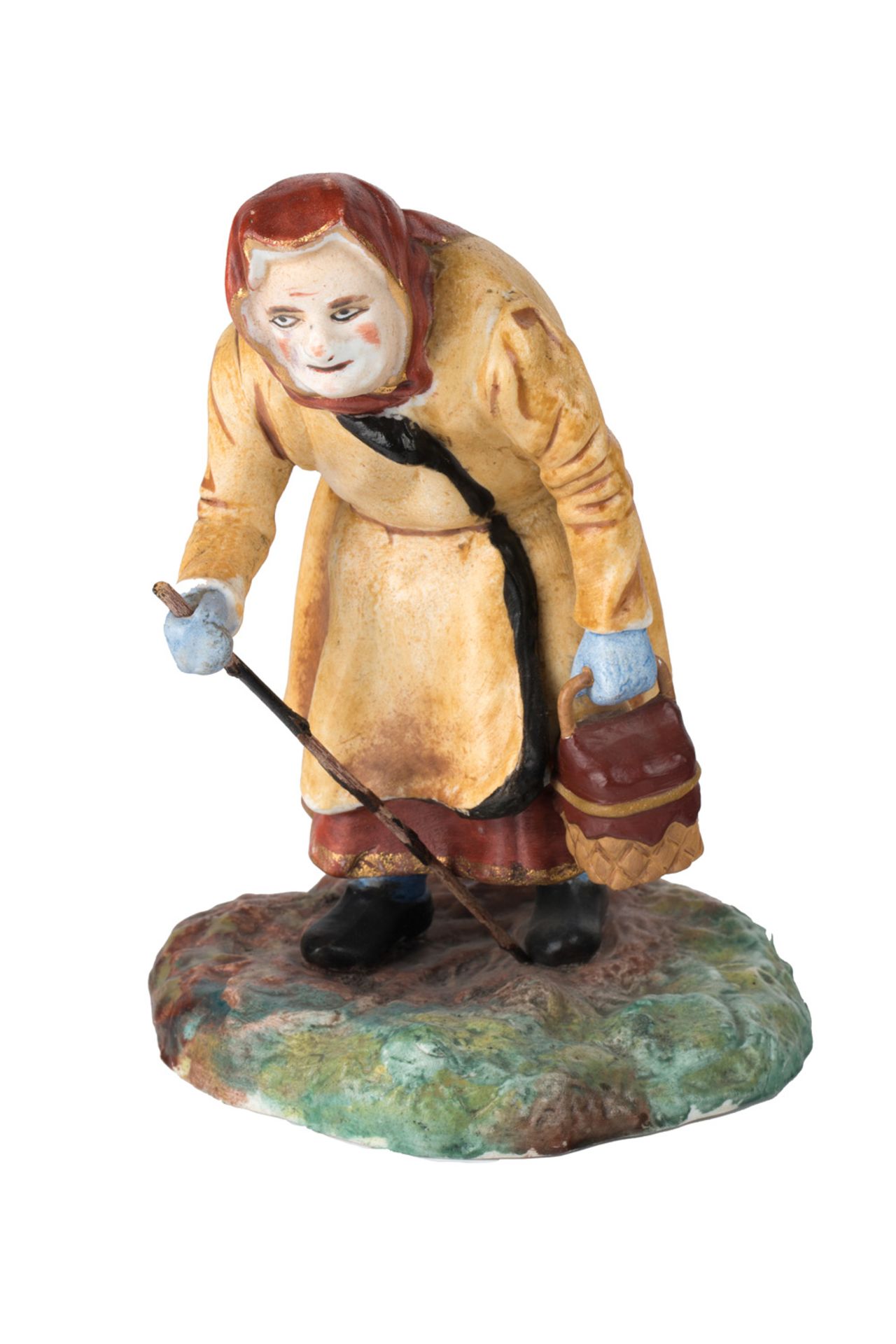 A RUSSIAN PORCELAIN FIGURE OF AN OLD, HUNCHED-OVER PEASANT WOMAN, GARDNER PORCELAIN FACTORY, MOSCOW