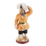 A RUSSIAN PORCELAIN FIGURE OF A FISH VENDOR, GARDNER PORCELAIN FACTORY, VERBILKI, MOSCOW, 1870S-1890